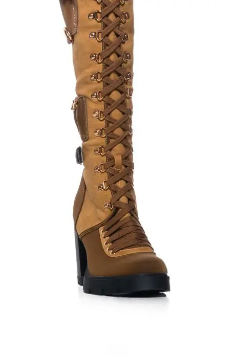 Brown Knee-High Boots with Straps and Gold Buckle Accents